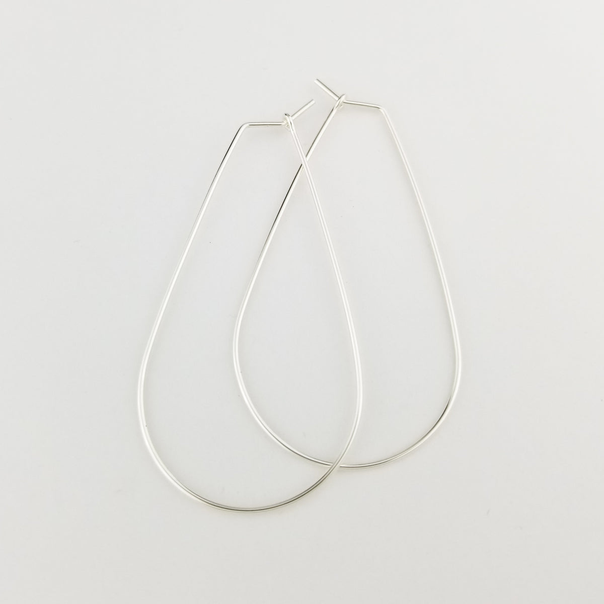 Thin Silver Teardrop Hoop Earrings
