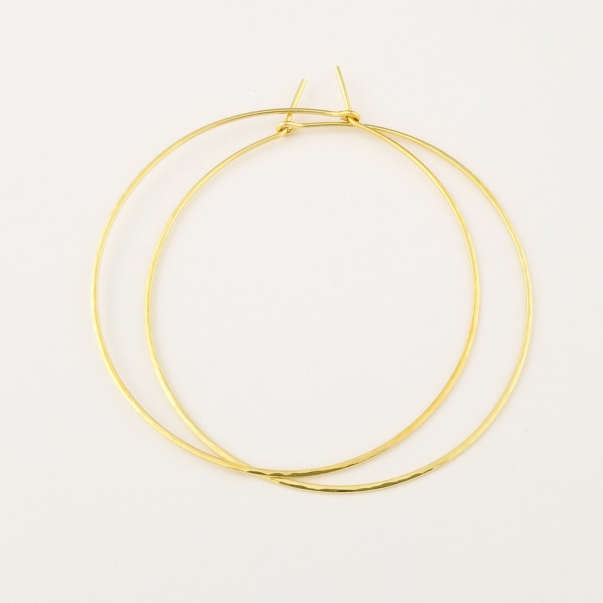 Hammered Gold Hoops on White Background