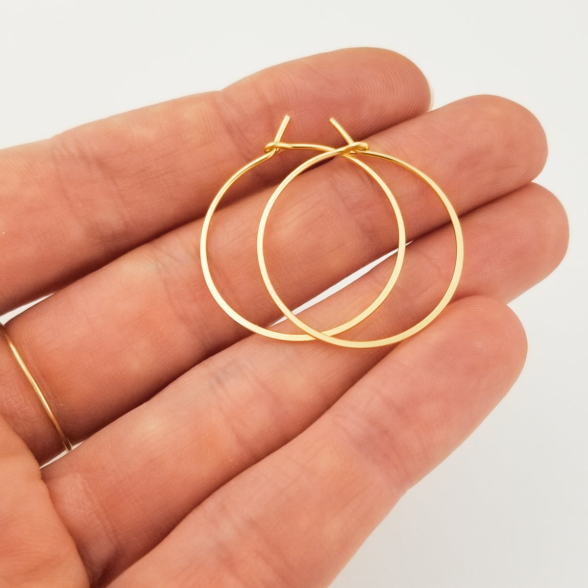 Gold Hoop Earrings Flat Hammered Thin Metal Wire on Hand